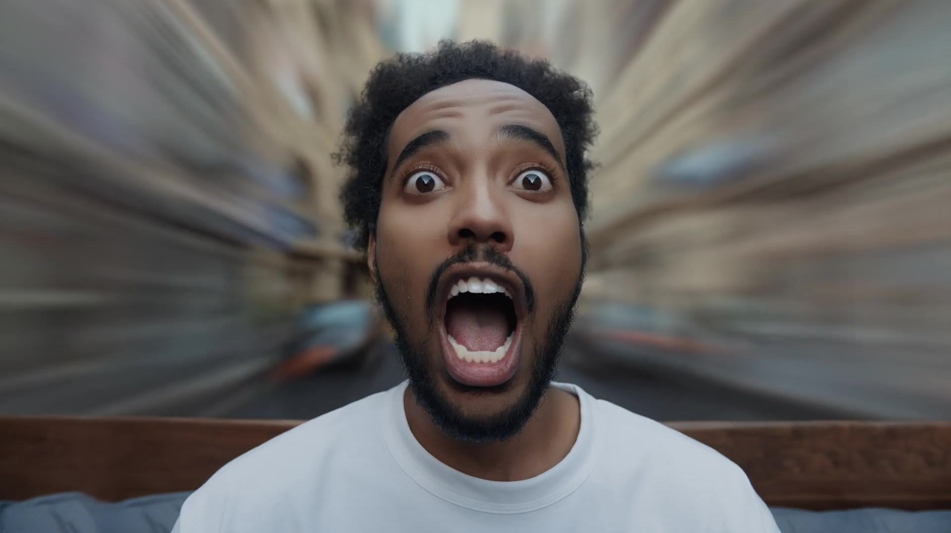 A face against the rush of the city.