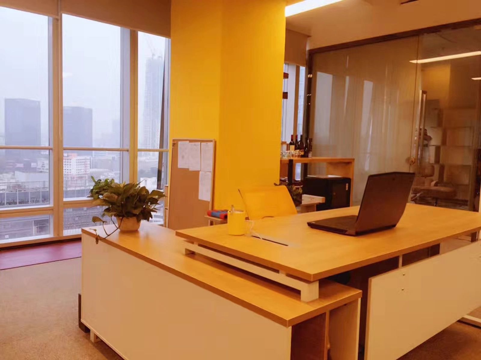 Corner office, city outside