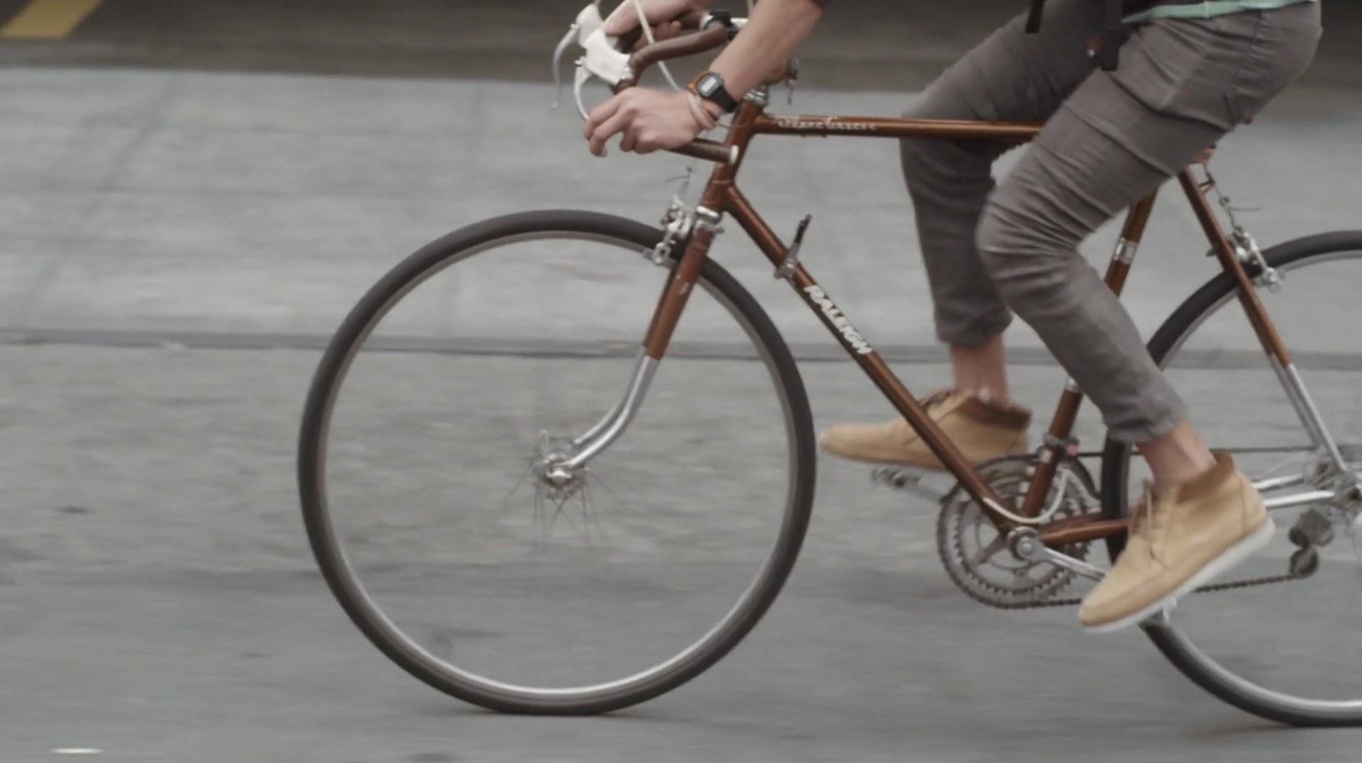 A bicycle moving through the street.